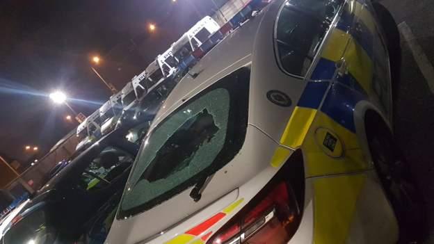 Police car with smashed roof