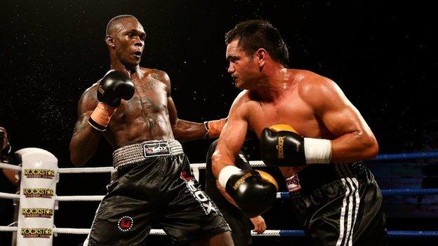 Israel Adesanya (L) fights Lance Bryant (R) during Super8 Fight Night on March 28, 2015 in Christchurch, New Zealand.