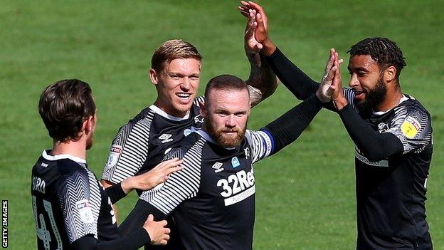 Derby celebrate Wayne Rooney's goal at Preston