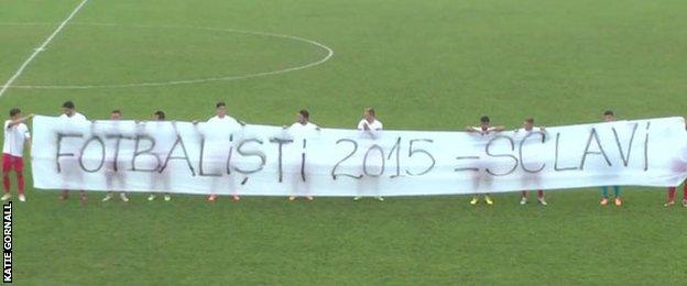 Romanian second division team Metalul Resita displayed a banner in protest at the treatment of players