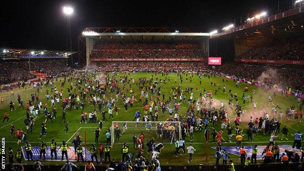 Pitch invasion at Nottingham Forest's City Ground