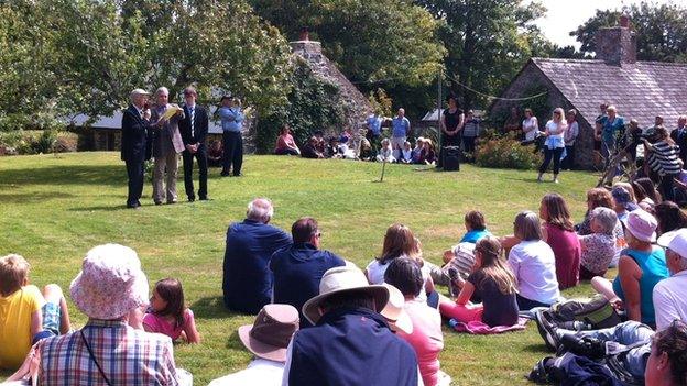 Seigneur of Sark Michael Beaumont speaking to a crowd