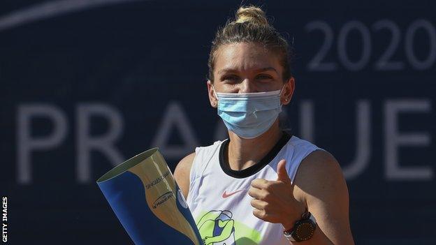 Simona Halep with her Prague Open trophy after beating Elise Mertens last weekend