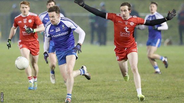 Monaghan's Fintan Kelly glides past Colm Cavanagh at Castleblayney