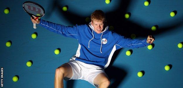 Kyle Edmund poses for the cameras before playing in the Junior Davis Cup in 2011