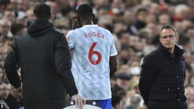 Manchester United manager Ralf Rangnick looks on as Paul Pogba is substituted against Liverpool