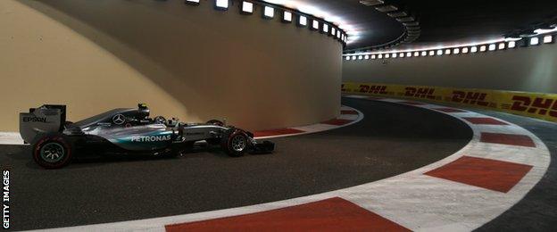 Nico Rosberg leaves the pits during the qualifying session at the Yas Marina circuit in Abu Dhabi