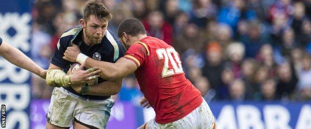 Scotland's Ryan Wilson took on Wales' Taulupe Faletau and came out on top