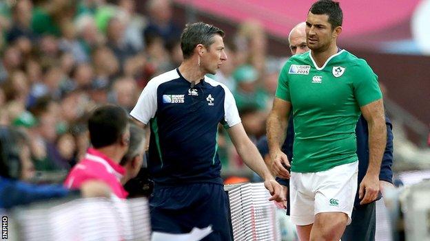 An injured Rob Kearney leaves the Wembley pitch for treatment