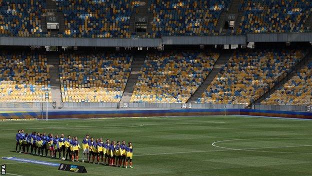 Players line up before kick-off before Shakhtar Donetsk against Metalist Kharkiv