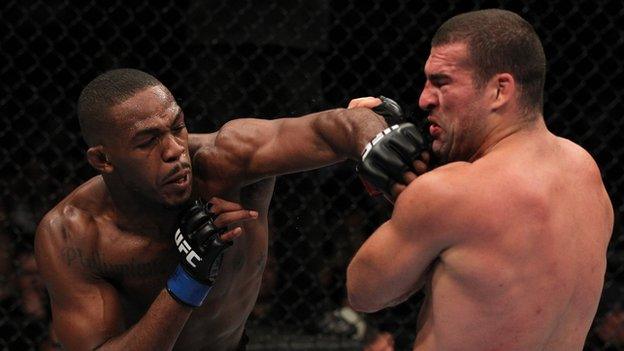 Mauricio "Shogun" Rua punches Jon Jones