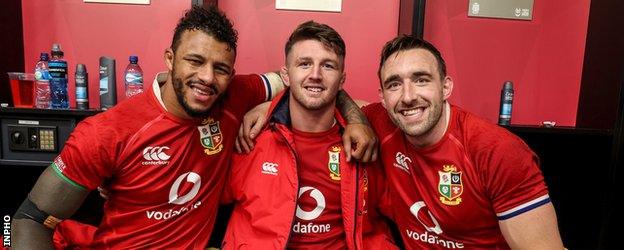 Courtney Lawes, Tom Curry and Jack Conan pose for a photo in the changing room