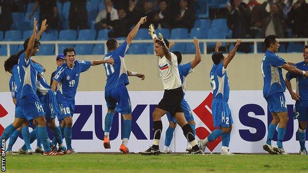The Philippines celebrate scoring against Singapore during the 2010 AFF Suzuki Cup match