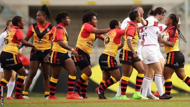 England and PNG players scuffle during Thursday's match