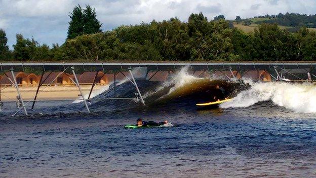 Surfers test the waves