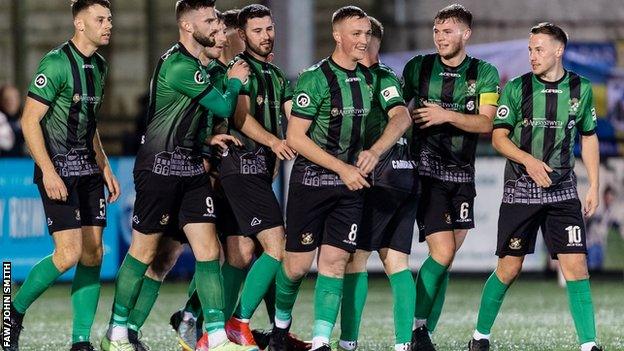 Aberystwyth Town's Harry Arnison celebrates after scoring against Haverfordwest