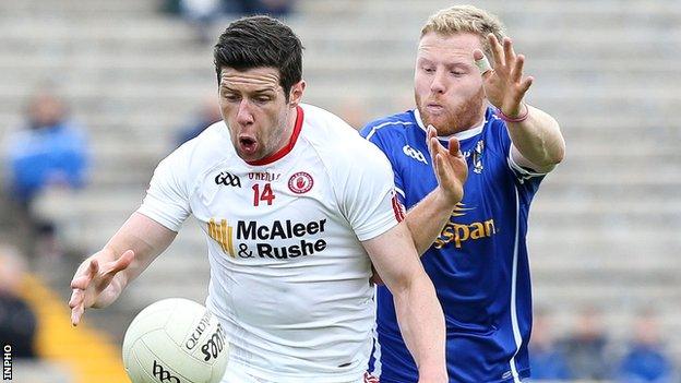 Tyrone's Sean Cavanagh battles with Cavan's James McEnroe in last year's Ulster semi-final replay