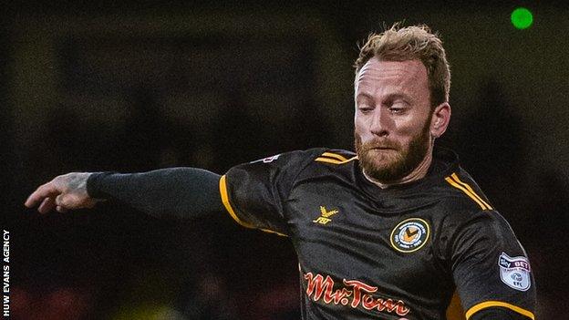 Sean Rigg shoots for goal for Newport County