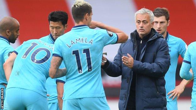 Jose Mourinho speaks to his Tottenham players