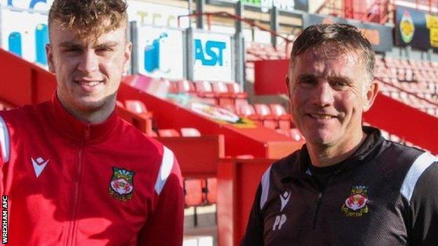 Ryan Austin with Wrexham manager Phil Parkinson