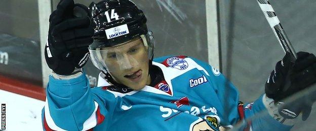 Mike Forney of the Belfast Giants celebrates scoring against Dundee