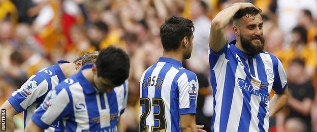 Sheffield Wednesday players dejected after their play-off final defeat