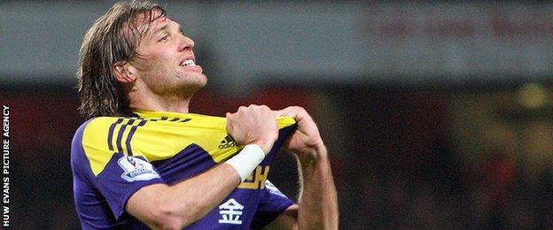 Michu celebrates scoring for Swansea