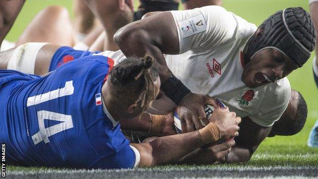 Maro Itoje scores a try against France