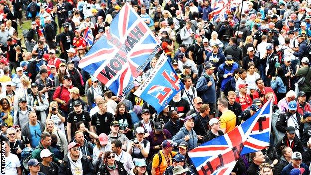 Fans celebrate with Lewis Hamilton at Silverstone