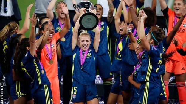 Alex Greenwood celebrating winning the Champions League