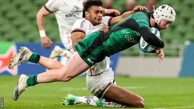 Mack Hansen scores a try in Connacht's recent hammering of Ulster despite Robert Baloucoune's efforts