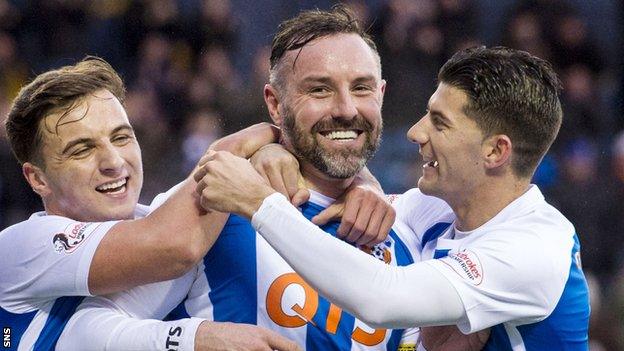 Eamonn Brophy and Jordan Jones help Krsi Boyd (centre) celebrate a goal for Kilmarnock