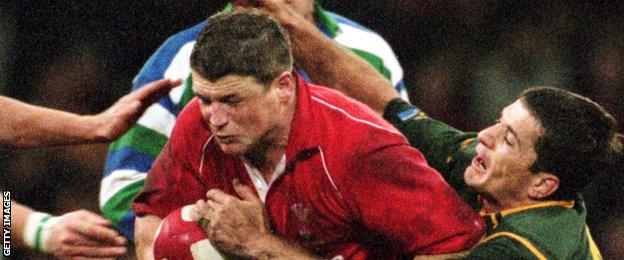 Joost van der Westhuizen tackles Wales' Scott Gibbs in November, 2000 - a game the Springboks won 23-13 in Cardiff