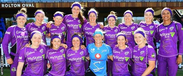 Sophie Devine with the Hobart Hurricanes squad