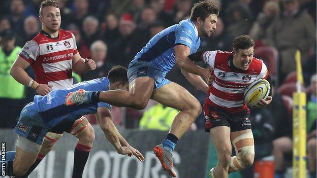 Billy Burns breaks away for a try for Gloucester against London Irish