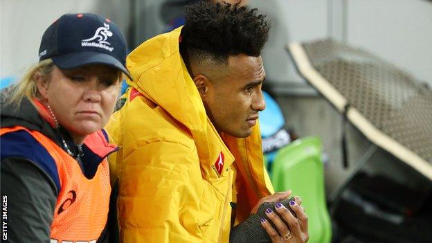 Australia scrum-half Will Genia cuts a forlorn figure on the bench after coming off injured in Melbourne