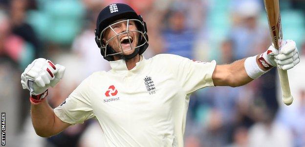 Joe Root celebrates his century