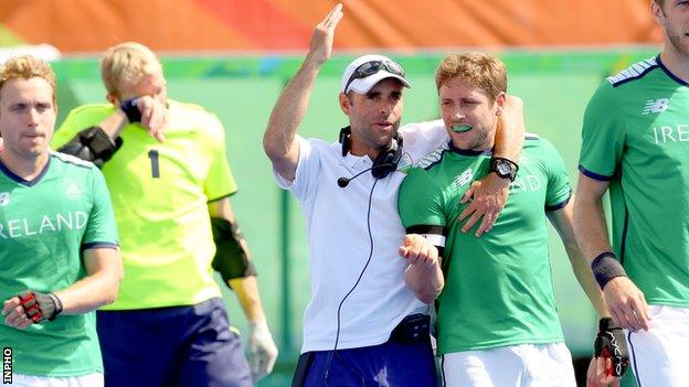 Craig Fulton (centre) celebrates with Ronan Gormley after their 4-2 win over Canada at the Rio Olympics