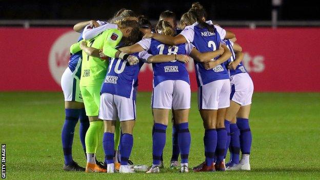 Birmingham players form a huddle