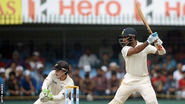 Cheteshwar Pujara (right)