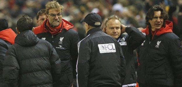 Jurgen Klopp celebrates Origi's goal and then turns towards Tony Pulis