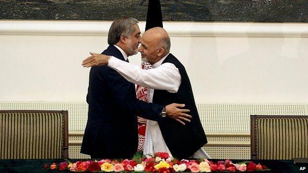 Abdullah Abdullah, left, and Ashraf Ghani sign a unity agreement in Kabul. 21 Sept 2014