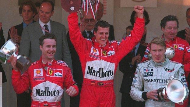 Michael Schumacher wins the Monaco Grand Prix from Eddie Irvine and Mika Häkkinen