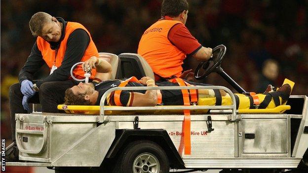 Leigh Halfpenny is carried off the field after injuring his knee