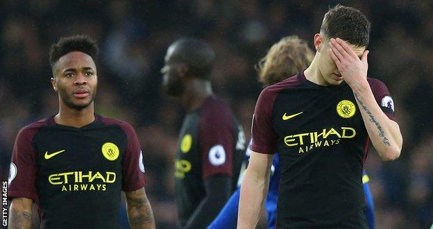 Man City forward Raheem Sterling and defender John Stones