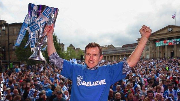 Dean Hoyle celebrates promotion to the Premier League