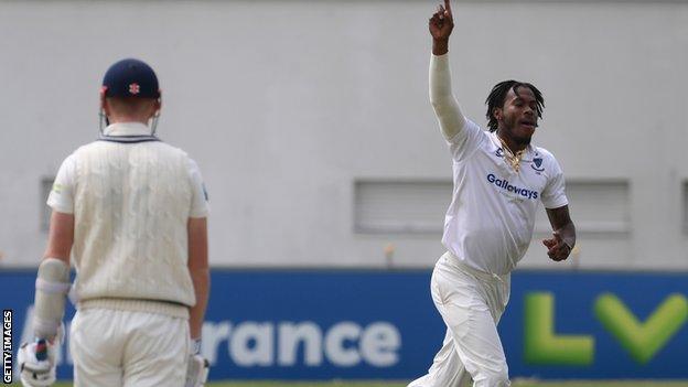 Jofra Archer celebrates taking the wicket of Zak Crawley