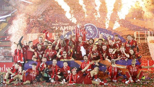 Liverpool players celebrate winning the 2019-20 Premier League title