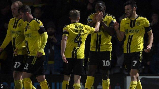 Burton players celebrate