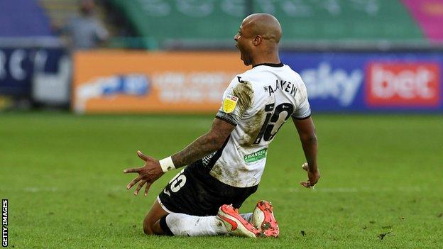 Andre Ayew celebrates after his Middlesbrough winner, his third successful penalty in three games